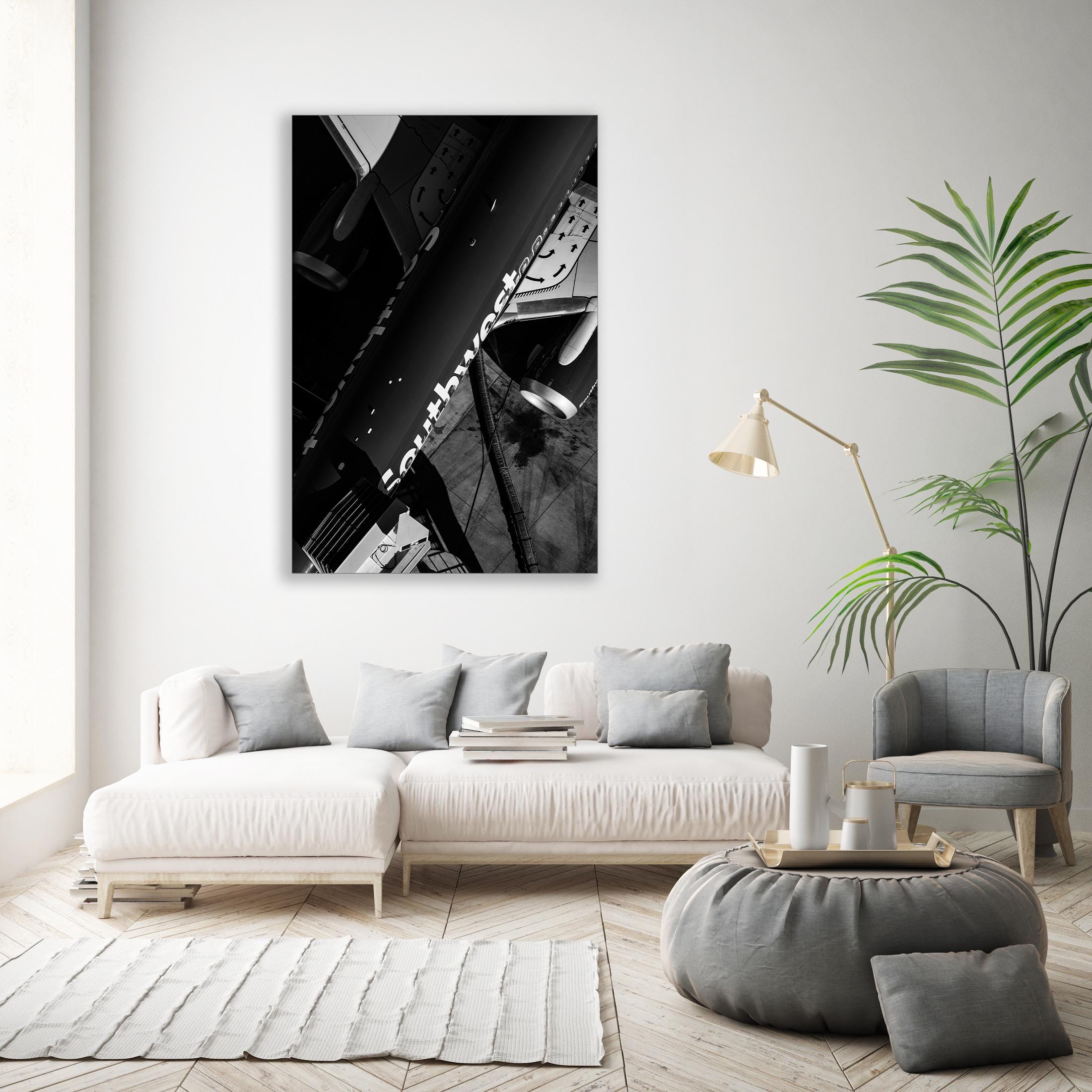 a black and white photo of a living room