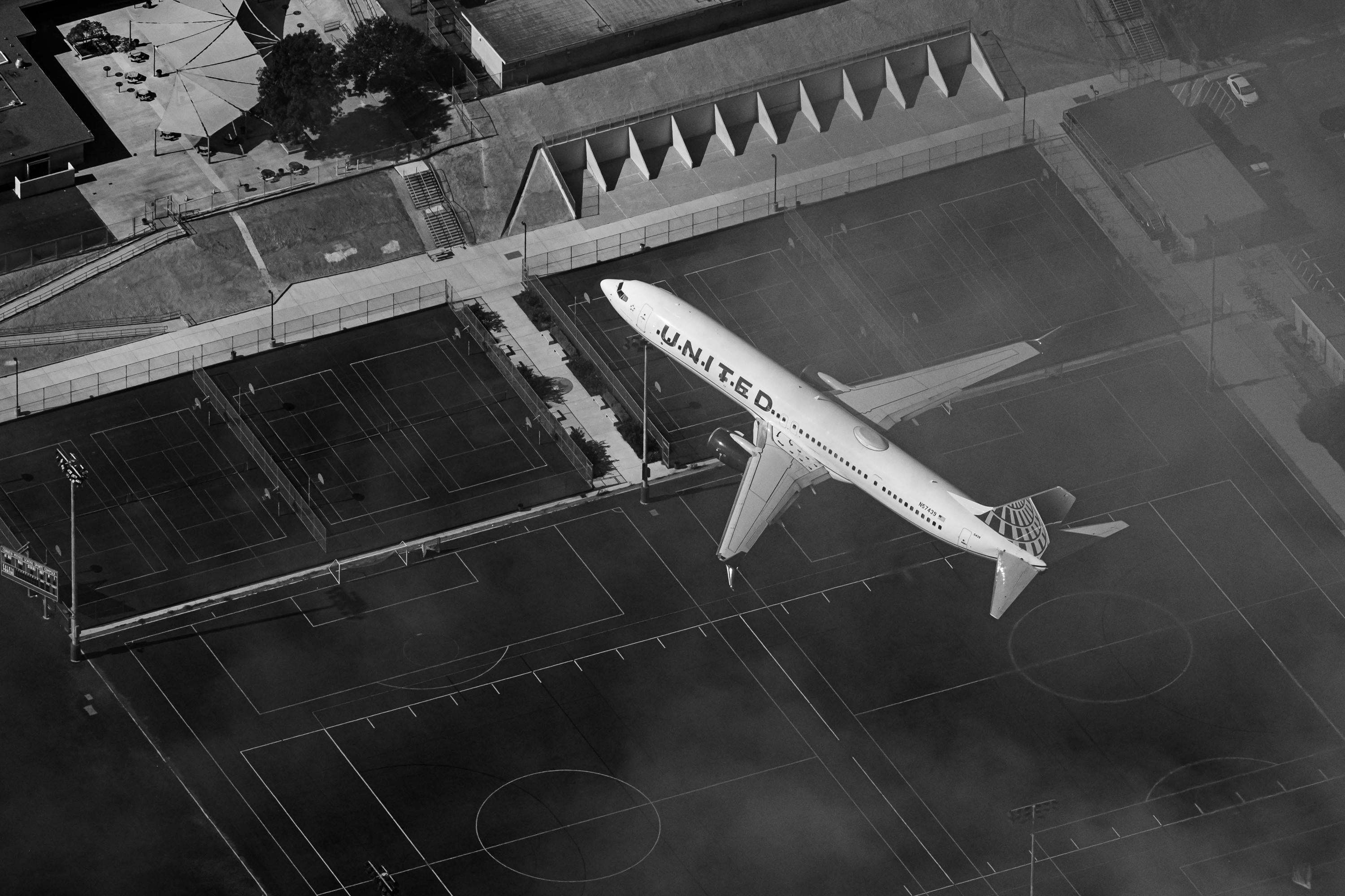 United 737 Departing out of San Diego International Airport N57439 - Black and White Aerial Photography (Metal & Bamboo Prints)