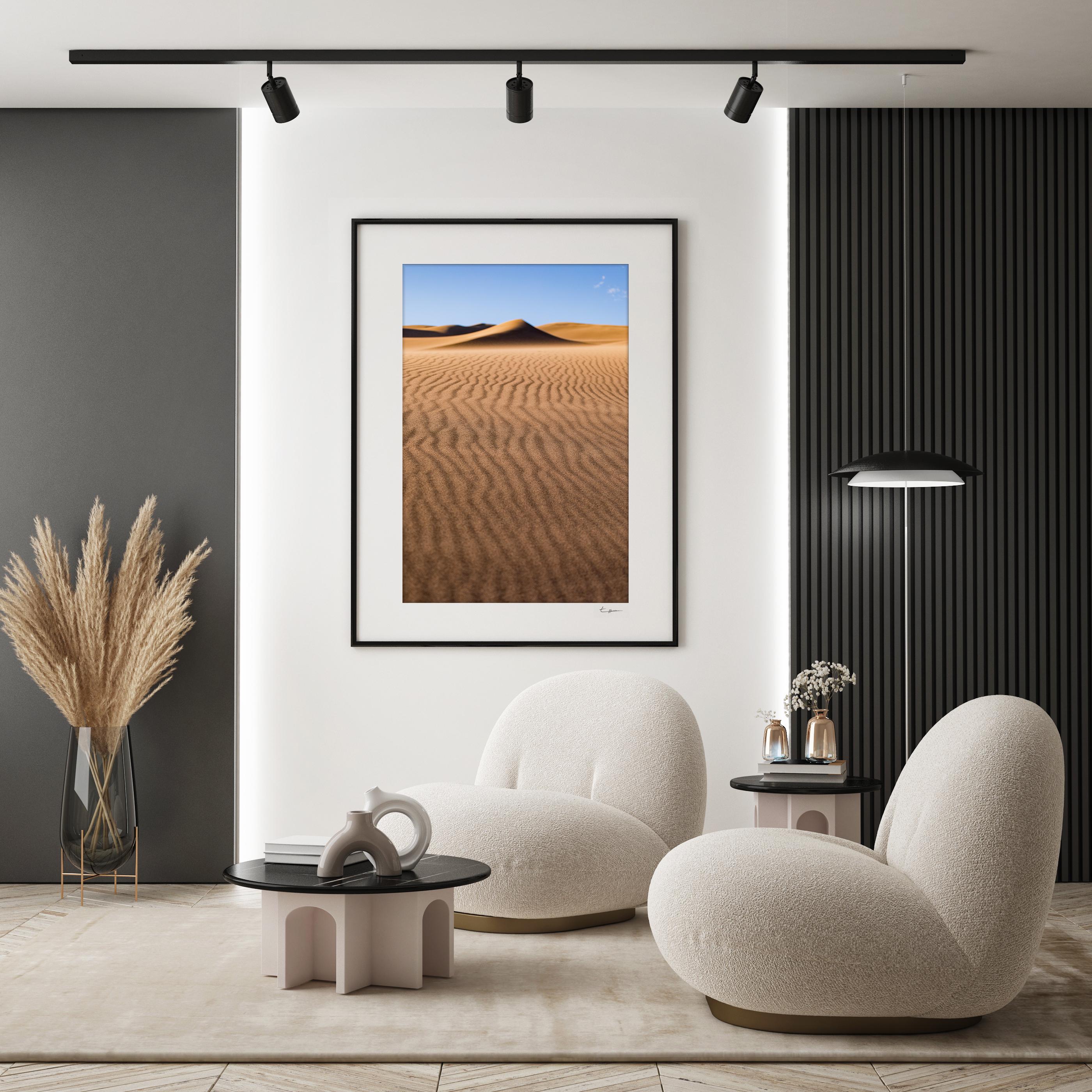 a living room with two chairs and a coffee table