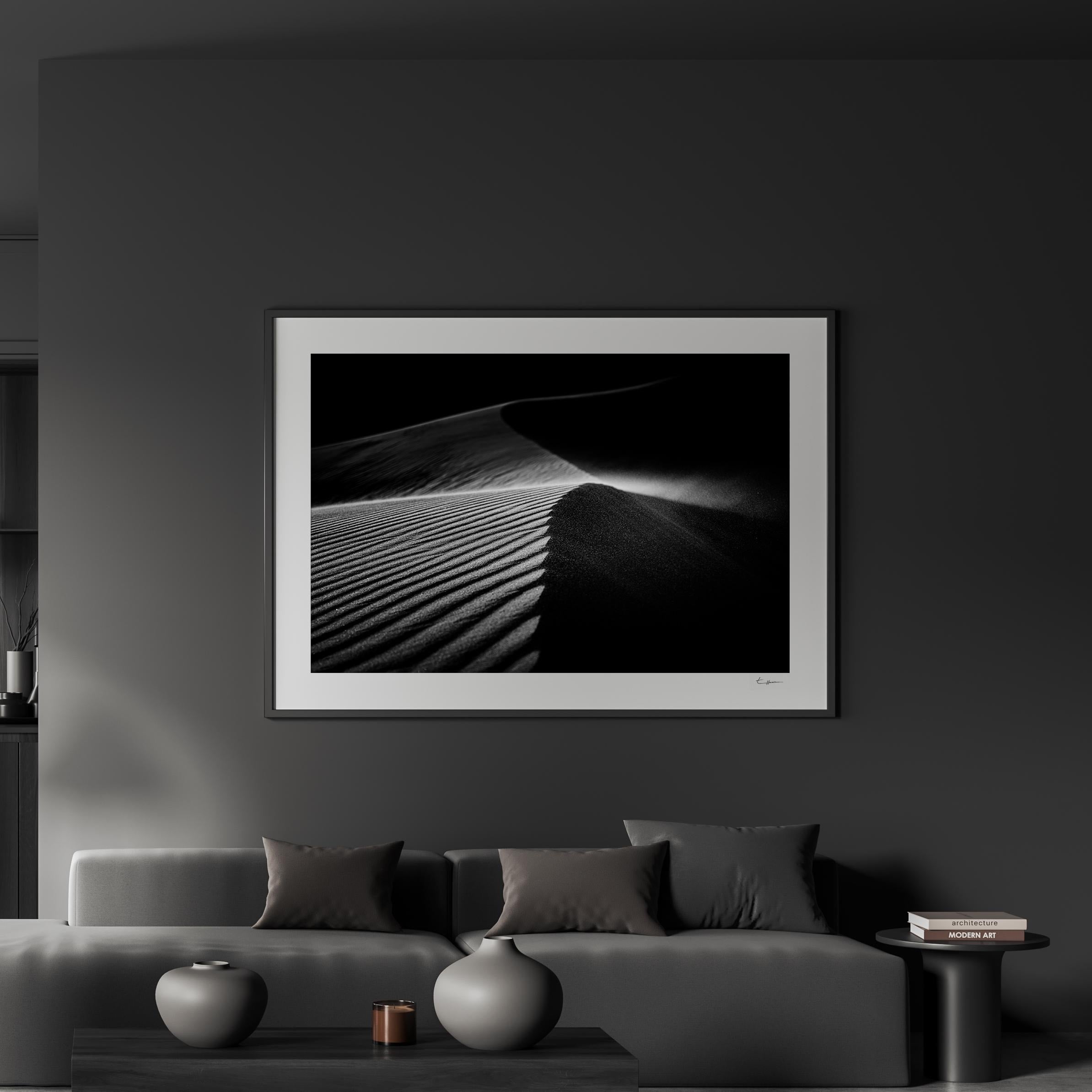 a black and white photo of a living room