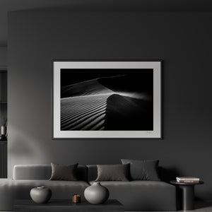 a black and white photo of a living room