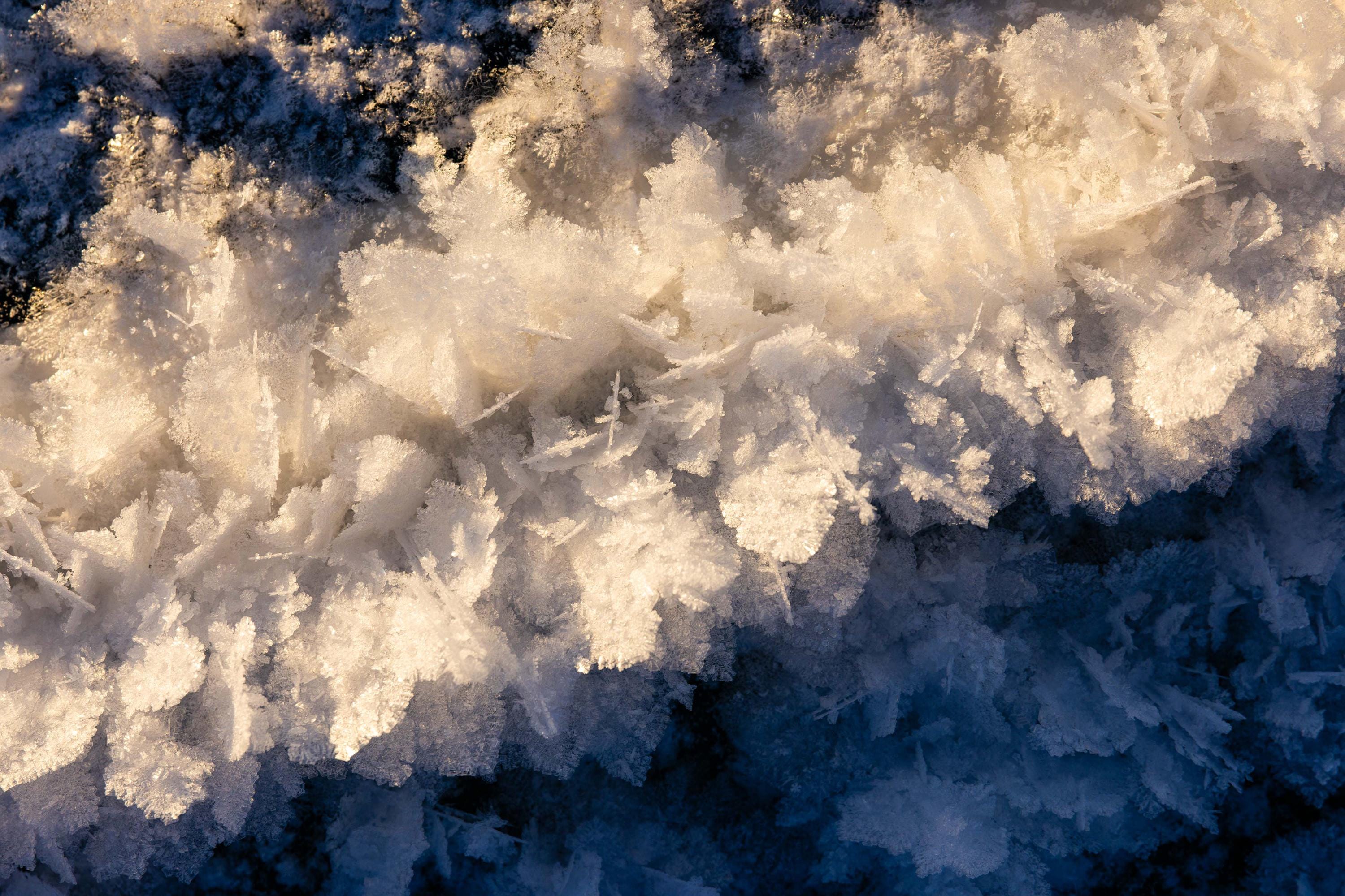 an aerial view of a wave in the ocean