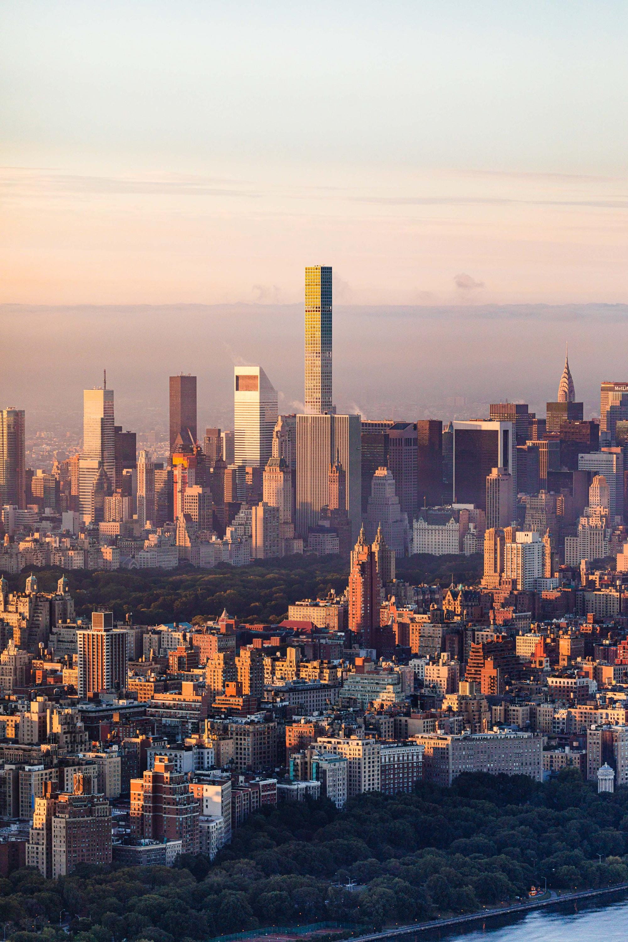 a view of a large city with tall buildings